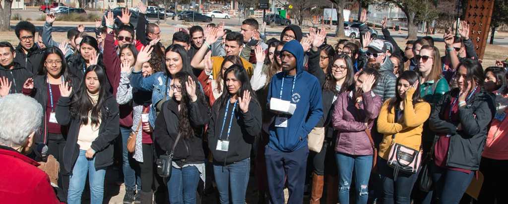 Students attending DWC receive instructions for an outreach in Arlington, TX.